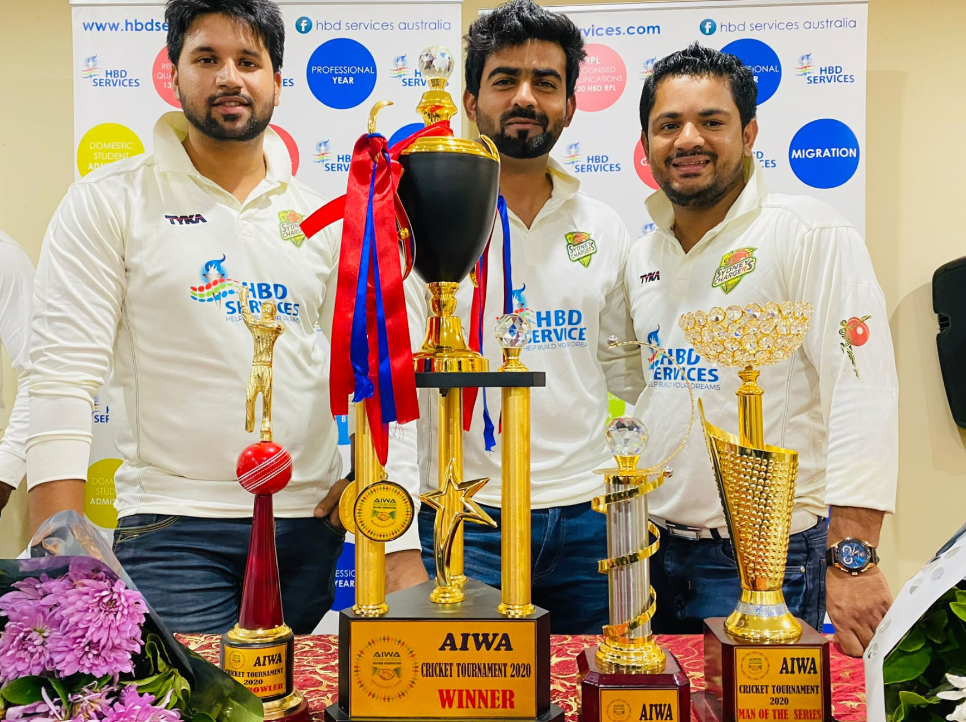 Sydney Chargers team with AIWA Cricket Tournament 2020 trophies