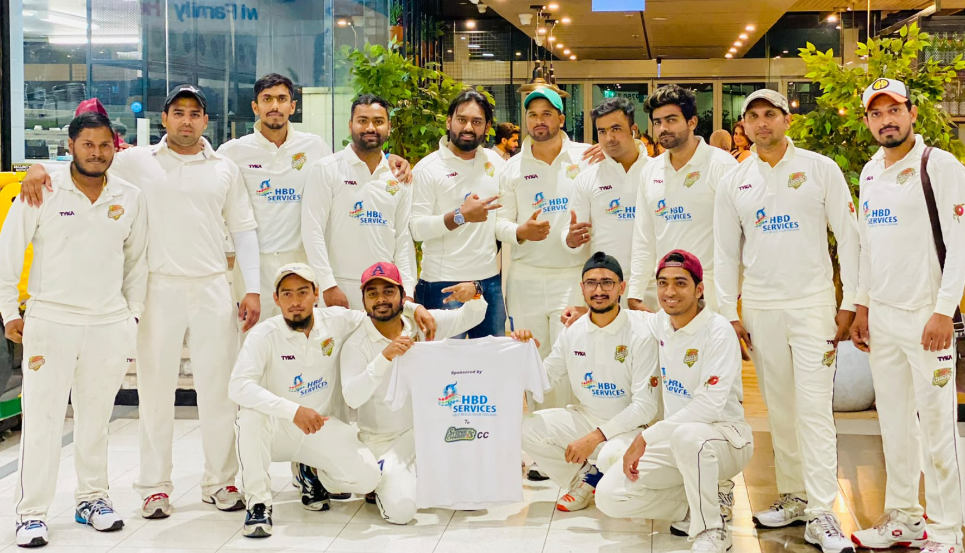 Sydney Chargers team in white kits with HBD Services sponsor shirt