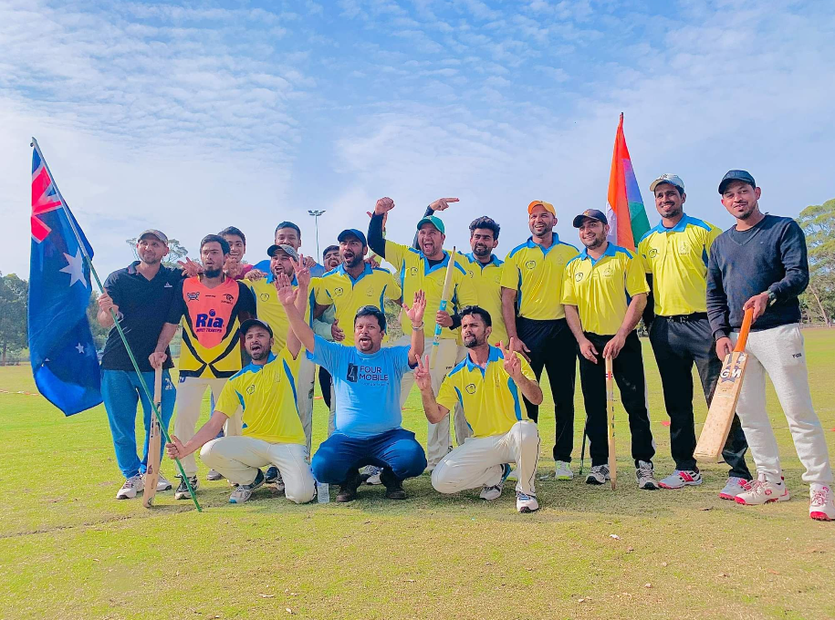 Sydney Chargers Cricket Club players celebrating a win on the field